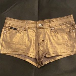 Dolce and Gabbana metallic gold shorts